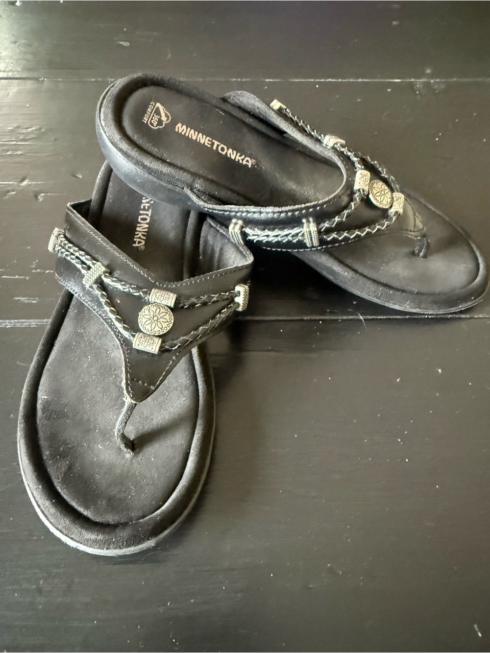 Minnetonka Black Leather Women's Braided Thong Sandals with Concho Accents